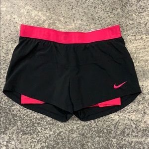 Pink Nike shorts